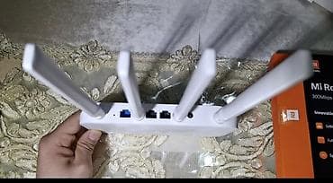 modem vifi: Xiaomi Mi Router 4C – 300 Mbps Wi‑Fi router Xüsusiyyətlər: - 2.4 GHz — 5