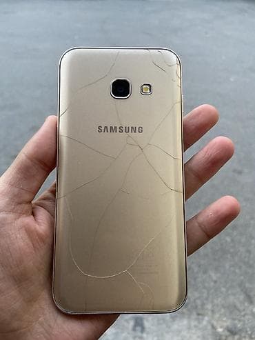 telefon samsunq: Samsung Galaxy A3 2017, 16 GB, rəng - Qızılı, Qırıq — 2