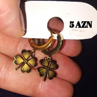 2 ədəd bijuteriya,dəst satılır.Sırğa yarpaq forma,üzük qaşlı — 2