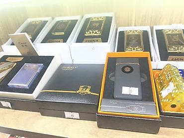 Şəxsi əşyalar: Elektron alışqanlar – fərqli modellər və hədiyyə qutularında Məhsul — 1