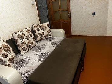 Çevrilə bilən divan - Rəng və material: Ağ süni dəri qol hissələri