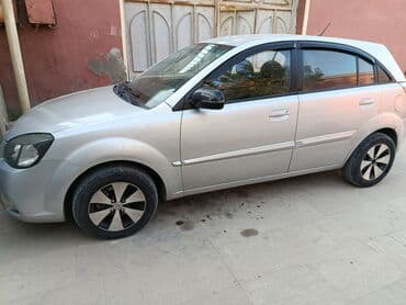 fiat doblo ölüxana: Kia Rio: 1.5 l | 2010 il Hetçbek — 3