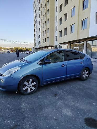 ford ehtiyat hisseleri: Toyota Prius (2-ci nəsil) hibrid hetçbek - Rəng: mavi - Salon: boz — 7