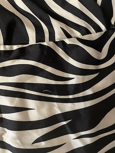 devit 3 qiyməti: Şəkildə gördüyünüz kimi, zebra naxışlı dondur. Materialı atlasdır — 4