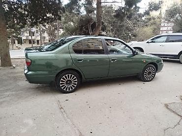 masin elani: Nissan Primera: 0.2 l | 1998 il Sedan — 2