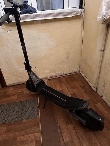 electro gitara: Elektrikli skuter – Xiaomi/Ninebot üslubunda şəhər üçün rahat model — 2
