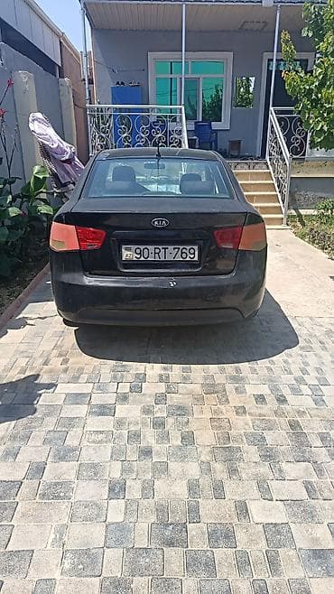 Kia Cerato (sedan), qara rəng. - Kuzov: kompakt sedan, arxa parklama — 1