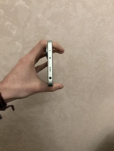 telefon tutan: Redmi Note 13, 256 GB — 3