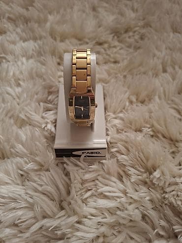 casio qadın saatı: Casio qadın qol saatı - Korpus və qolbaq: qızılı rəngdə paslanmayan — 1