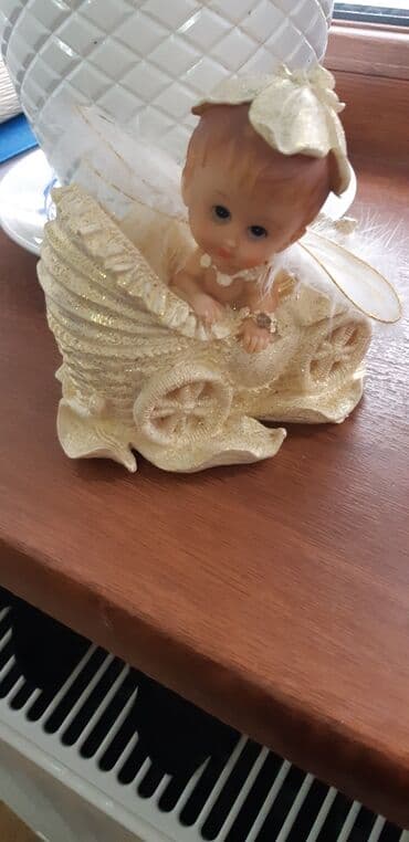 qızıl 10 luq qiymeti 2023: Suvenir uşaq kolyaskada — 1