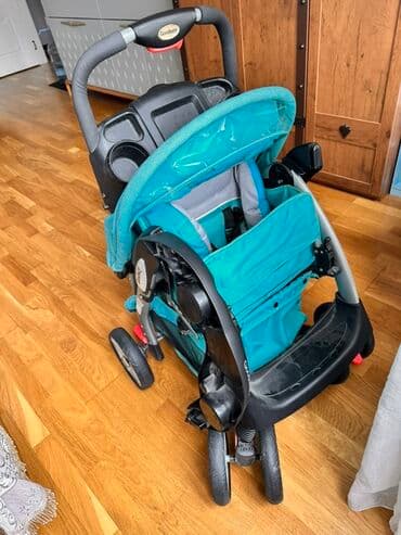 uşaqlar üçün qulaqciq: Uşaq arabası uşaqla gəzintilər üçün nəzərdə tutulub, tünd firuzəyi — 1