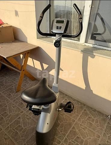 Mağaza tipli statik velotrenajor - Kompakt, şaquli dizayn – evdə və