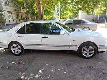 met: Mercedes-Benz E-Class: 2 l | 1996 il Sedan — 4