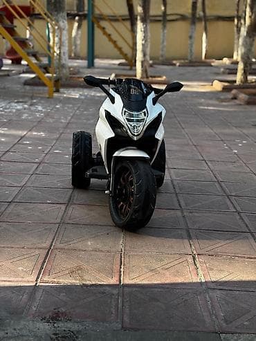 sukan oyunu: Uşaq üçün elektrikli üçtəkərli motosiklet - Model: “New Youth 08” — 2