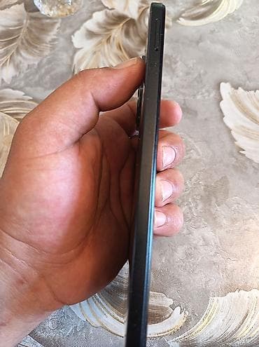philips xenium 9@9h: Xiaomi Redmi smartfon - Arxa paneldə “Redmi” loqosu, kvadrat formalı — 5