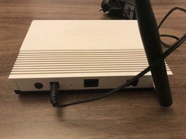 tp link 8151n: TP-Link TD-W8951ND modelindən olan simsiz ADSL2+ modem-router evdə və — 2