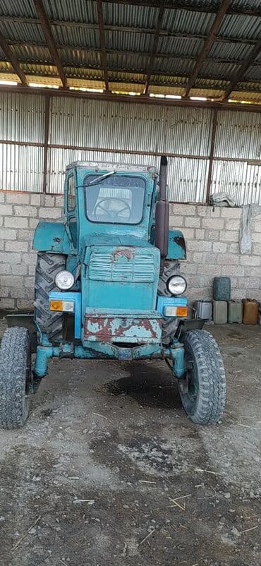 диски на авто бмв: Təqdim olunan mavi rəngli traktor kənd təsərrüfatı işləri üçün nəzərdə — 1