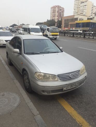 Nissan Sunny: 1.3 l | 2006 il Sedan