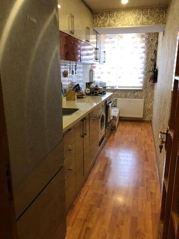 aylıq kirayə ev: Elmlər metrosunun yaxınlığında 9 mertebeli binanın 6-cı mərtəbəsində — 4