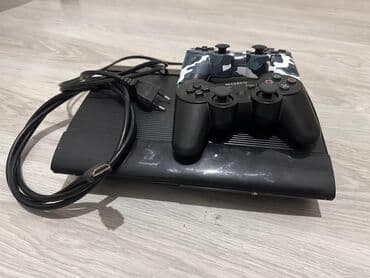цена плейстейшен 3: PS3 Super Slim. 2 dualshock pult. hdmi ve guc kabeli. icinde 33 oyun — 2