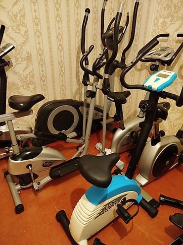 Müxtəlif modellərdə idman trenajorları. Hər biri evdə idman etmək üçün