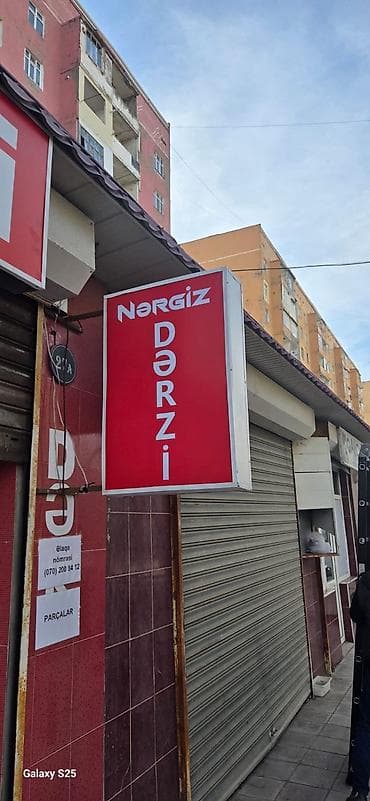 loqolar: Xidmət: İşıqlı reklam lövhələri və interyer brendinqi Təsvir: - Fasad — 5