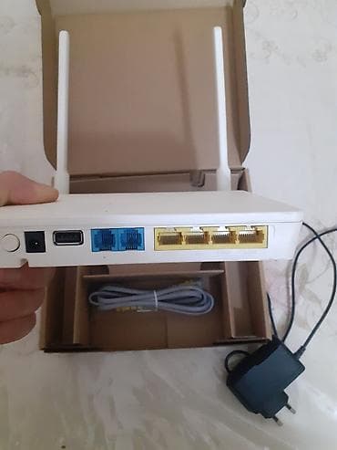 Комплектующие для ПК и ноутбуков: İki antenli Wi‑Fi router/modem Xüsusiyyətlər: - 2 ədəd güclü xarici — 3