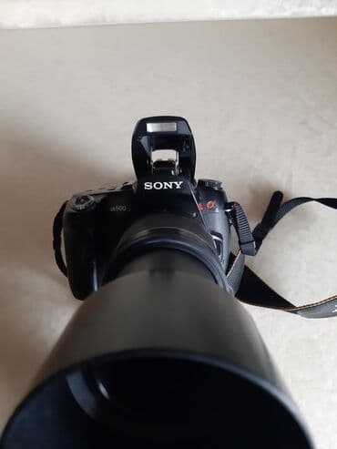 knopkalı: Fotoaparat Sony a500. Probeqi azdır. Şəkil çəkmək üçün knopkası — 8