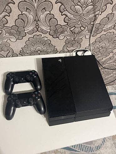video: Playstation 4 1TB. Ideal veziyyetdedir. Hec bir problemi yoxdu. Evde — 1