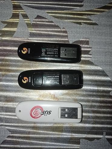 oteeto tab 16: Salam. Şəkillərdə görünən 3 ədəd köhnə nəsil USB modemi hamısı bir — 2