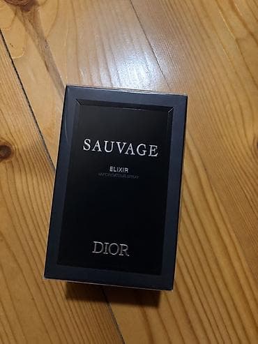 note tonal krem: Dior Sauvage Elixir kişi ətri. Orginal Dior Qutunun üzərində “Sauvage — 1