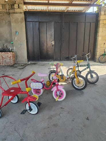 Manejlər: Fərqli ölçülərdə və rənglərdə olan uşaq velosipedləri satışdadır. Hər — 1