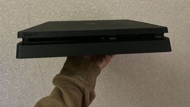 Sony PlayStation 4 Slim oyun konsolu Xüsusiyyətlər: - Model: PS4 Slim