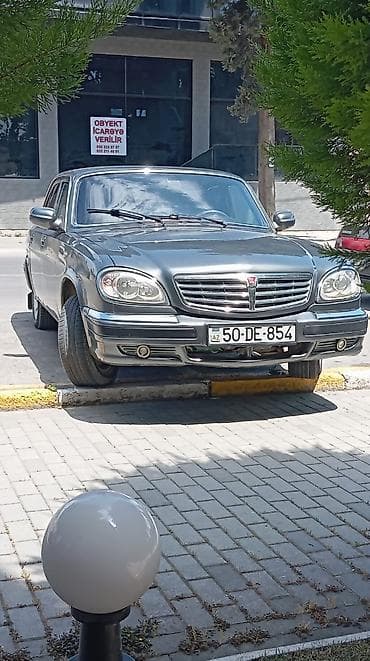 GAZ-31105 Volga sedan - Kuzov: 4 qapılı sedan, tünd boz (metallic)