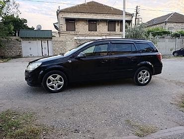 bmw e60 disk: Opel Astra: 1.4 l | 2007 il 286900 km Universal — 5