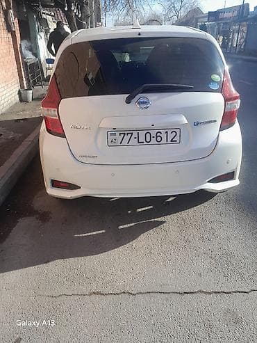 Продажа авто: Nissan Note e-POWER “Medalist” – ağ rəngli, şəhər üçün ideal hibrid — 2