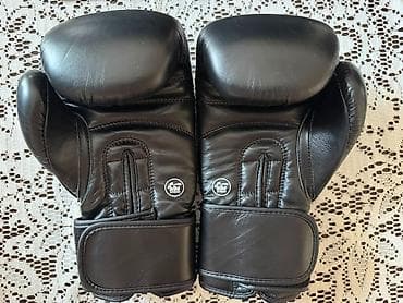 Adidas markalı, qara rəngdə tam dəri boks əlcəkləri satılır. Tam — 2