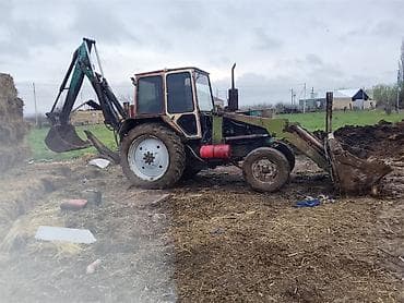 Ekskavator-yükləyici (traktor əsaslı) – ön kovası və arxa ekskavator