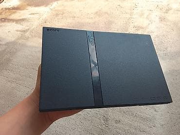 kitab alan: Sony PlayStation 2 Slim (PS2 Slim) oyun konsolu - Model: SCPH-7xxxx — 1