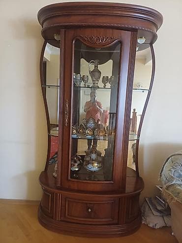 Şüşəli dolab vitrini, İşlənmiş, Ünvandan götürmə