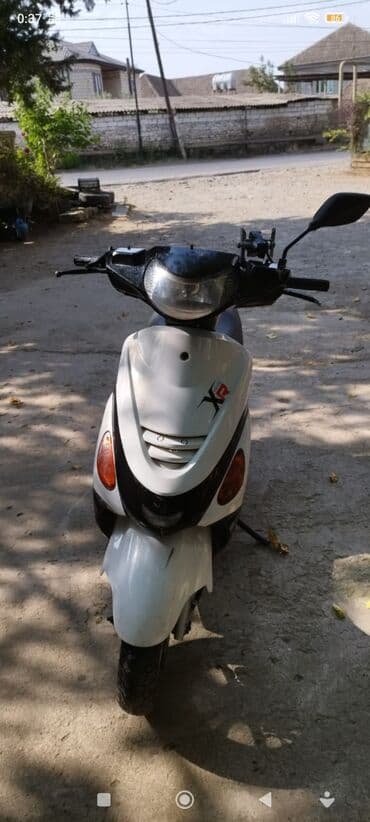 Skuter XRoad XR - Rəng: ağ/qara iki rəng - Kuzovda “XR/ XRoad”