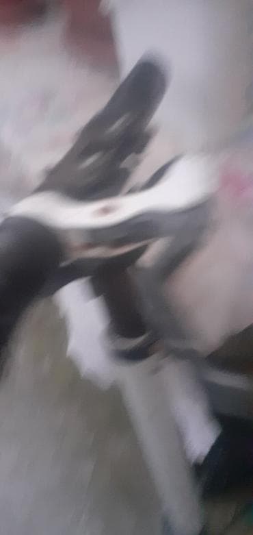 met: Məhsul: Şəhər tipli ayaqlı skuter Xüsusiyyətlər: - Konstruksiya — 5