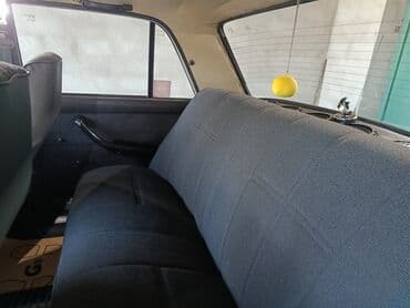 VAZ 2107, ağ rəngli sedan Xüsusiyyətlər: - Kuzov: 4 qapılı sedan, ağ