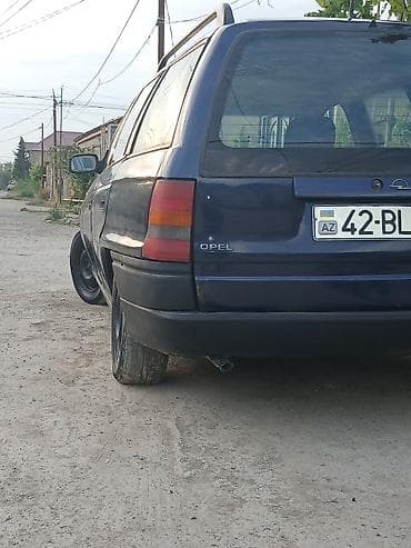 128 style e60: Opel Astra: 1.6 l | 1995 il Universal — 3