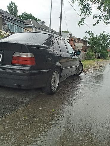 BMW 3 series: 1.6 l | 1993 il Sedan — 5