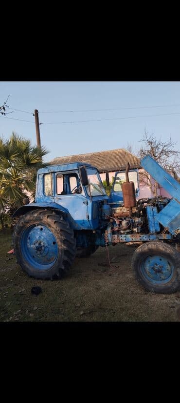 rengli işıq: Mavi rəngdə MTZ tipli təkərli traktor. Texniki xüsusiyyətlər və — 4