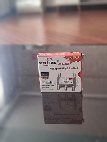 switch 2: STAR TRACK ST-41NEW 4-Way DiSEqC Switch - 4 giriş, 1 çıxış: eyni — 1