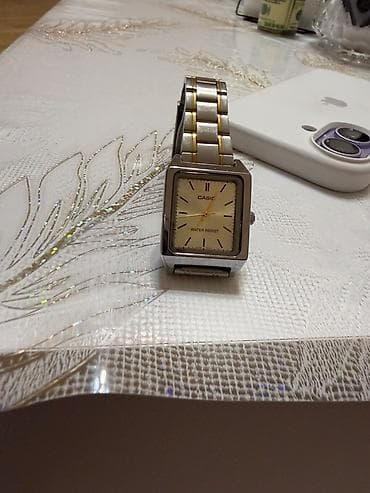 Qol saatları: Casio kişi qadin qol saatı - Korpus: düzbucaqlı, paslanmayan polad - — 1