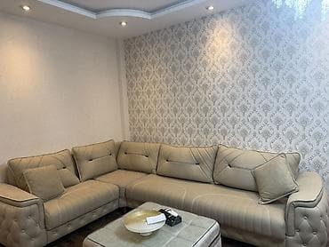 taxt doweyi: Bej rəngli L formalı künc divan - Müasir dizayn: yumşaq xətlər — 2