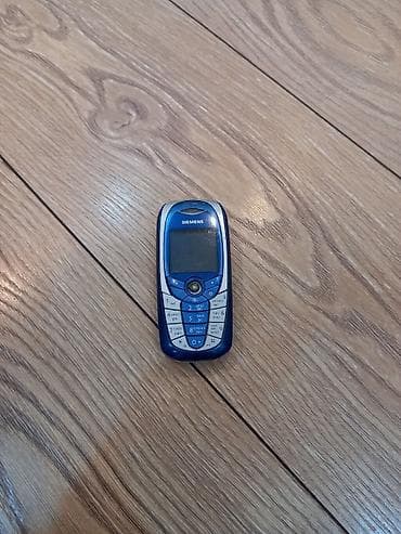 Batereyası şişib üzərində iki ədəd orginal adabteri verilir Siemens